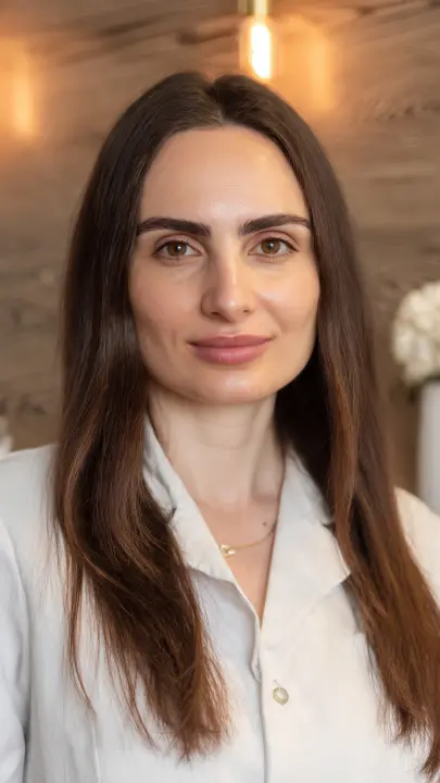 Professional female doctor or health specialist portrait in white coat, holding tablet